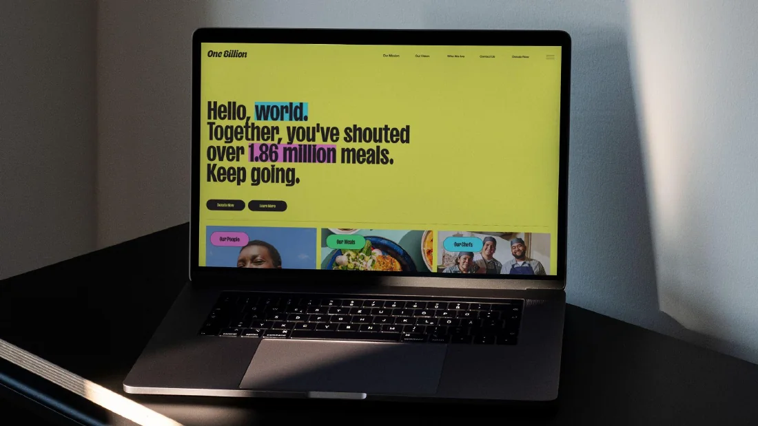 It's Your Shout website shown on a laptop